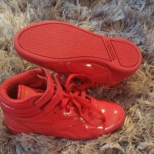 Reebok Kids' Freestyle Hi Patent Shoes.